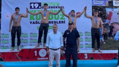 CW Enerji Vezirköprü Yağlı Güreşlerinde, güreş antrenörleri Hüseyin Uğuz ve